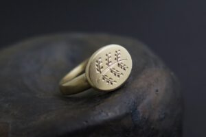 Gold signet olive branch