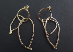 Gold fuselage earrings