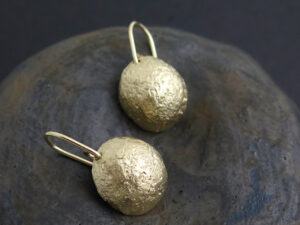 Gold seed pod earrings