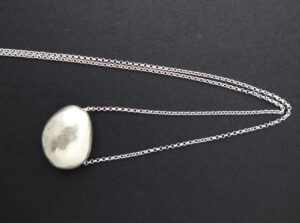 Silver pod neckpiece