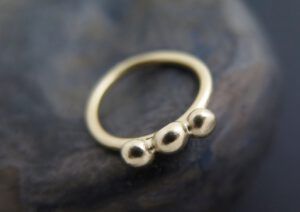 Triple petite ring